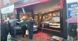 Norfolk taxi crashes through Bean cafe window